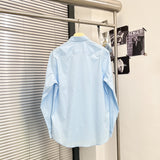 Burberry clothing angled view — premium authentic designer style