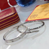 Front view of Cartier unisex jewelry piece