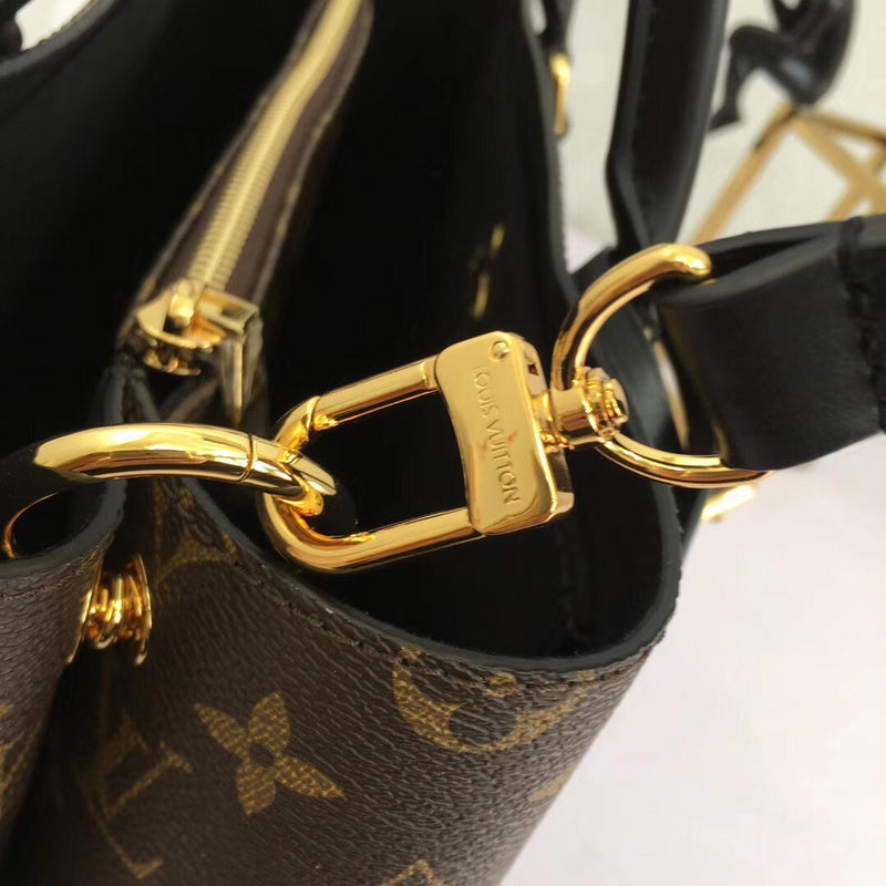 Top view of polished elevated women's handbag – women's luxury accessory