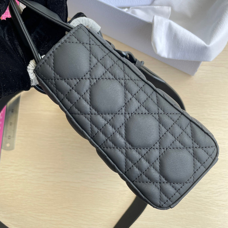Styled lifestyle shot of elevated statement women's handbag – women's luxury handbag