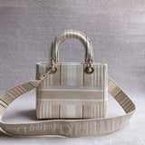 Close-up detail of polished classic women's handbag – women's luxury accessory