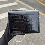 Side view of understated structured handbag