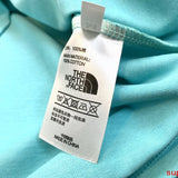 Close-up detail shot of Rhude luxury clothing with runway-inspired design