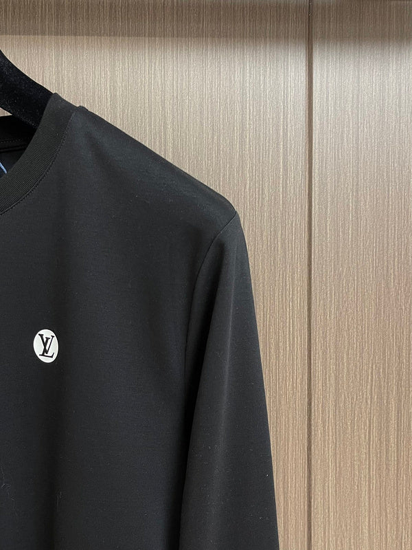 Full styled look of Louis Vuitton luxury clothing with tailored silhouette