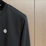 Full styled look of Louis Vuitton luxury clothing with tailored silhouette