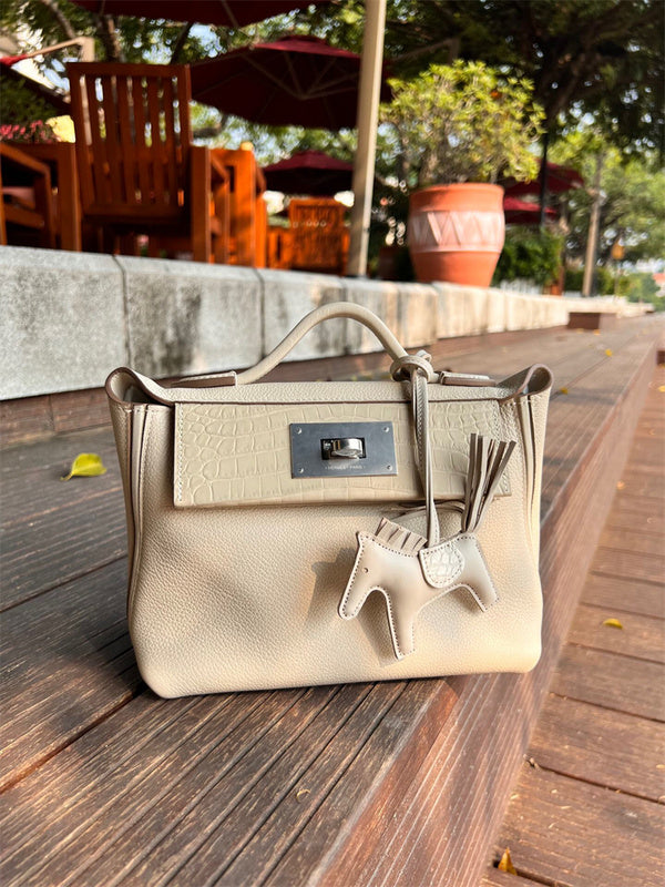 Side view of structured structured handbag