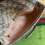Close-up detail of classic signature women's handbag – women's designer-style accessory