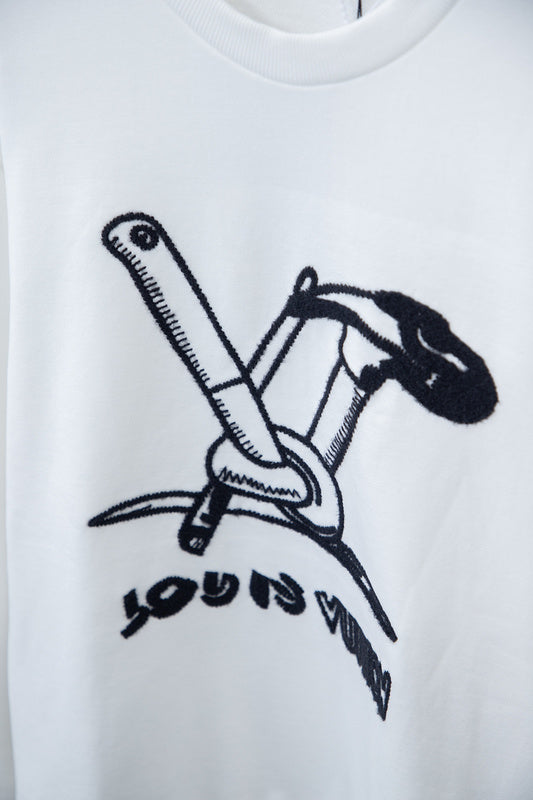 Full styled look of Louis Vuitton luxury clothing with logo-detail design