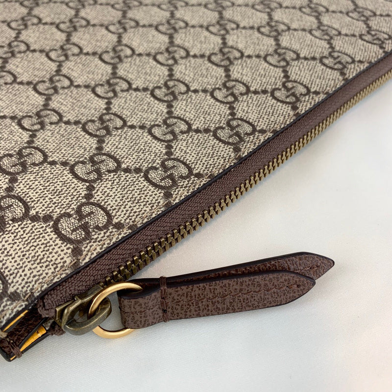 Handle and strap detail of classic polished women's handbag – women's designer-style accessory