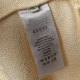 Close-up detail shot of Gucci luxury clothing with tailored silhouette