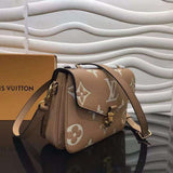 Close-up detail of structured polished women's handbag – women's luxury accessory