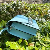 Close-up detail of poised bag design