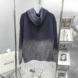 Flat lay presentation of Louis Vuitton luxury clothing with relaxed-fit cut
