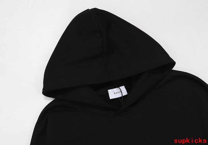 Flat lay presentation of Rhude luxury clothing with streetwear-inspired cut