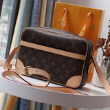 Front view of modern sleek women's handbag – women's premium purse