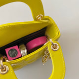 Close-up detail of structured signature women's handbag – women's designer-style accessory