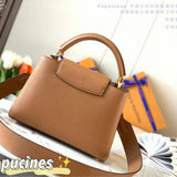 Styled lifestyle shot of premium signature women's handbag – women's designer-style accessory