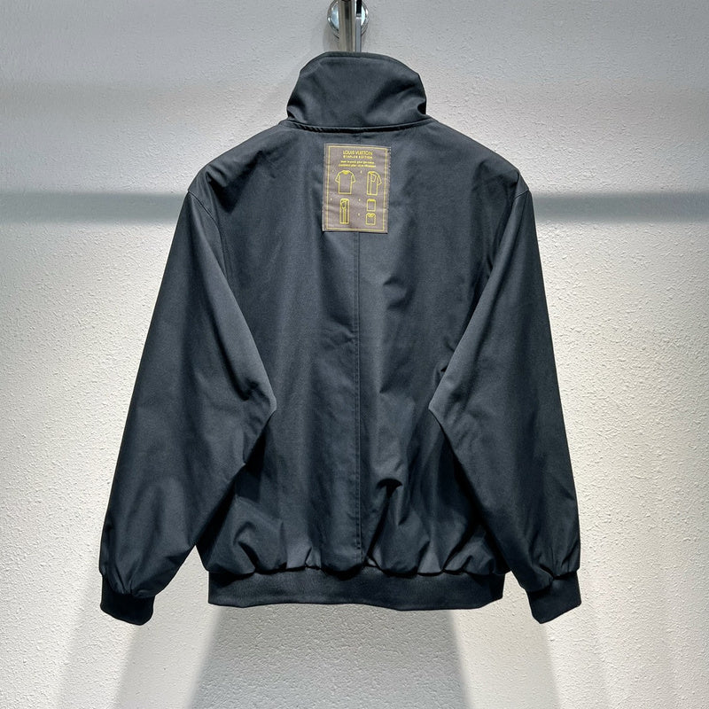 Side profile of Louis Vuitton luxury clothing with label-forward styling