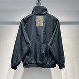 Side profile of Louis Vuitton luxury clothing with label-forward styling
