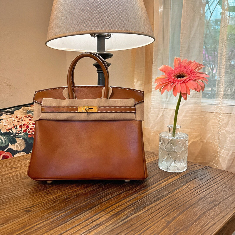 Side view of elegant structured handbag