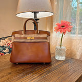 Side view of elegant structured handbag