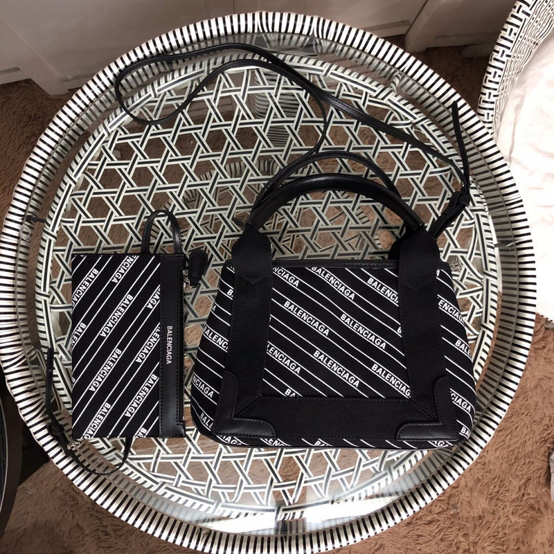 Side profile of chic polished women's handbag – women's luxury handbag