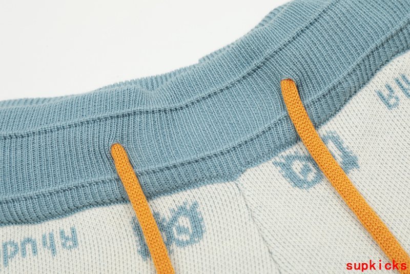 Close-up detail shot of Rhude luxury clothing with runway-inspired design