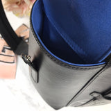 Styled lifestyle shot of structured chic women's handbag – women's luxury accessory