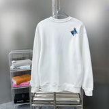 Side profile of Louis Vuitton luxury clothing with label-forward styling