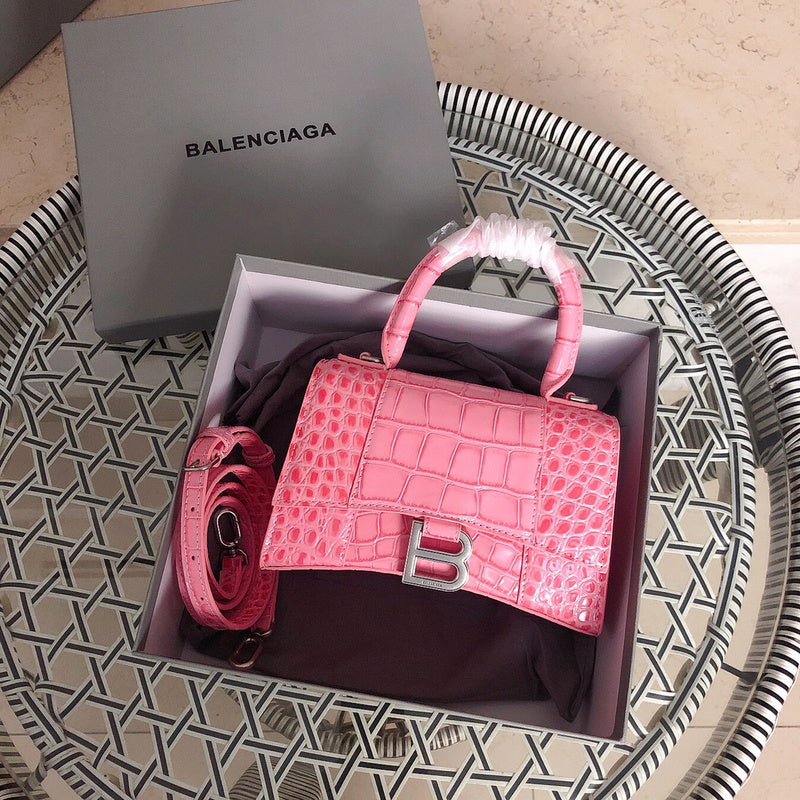 Side profile of structured classic women's handbag – women's luxury handbag