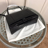 Back view of sleek classic women's handbag – women's everyday handbag