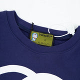 Close-up detail shot of Gucci luxury clothing with everyday silhouette