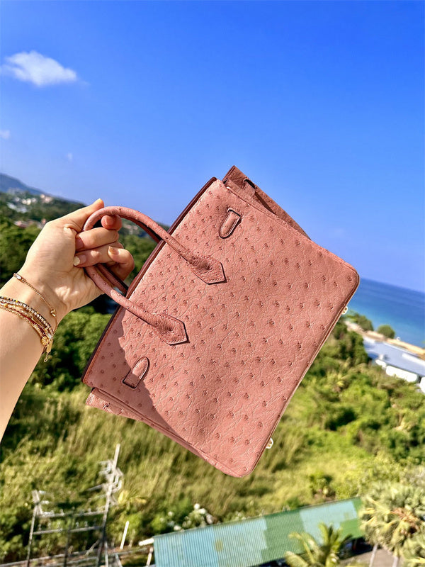 Side view of classic structured handbag