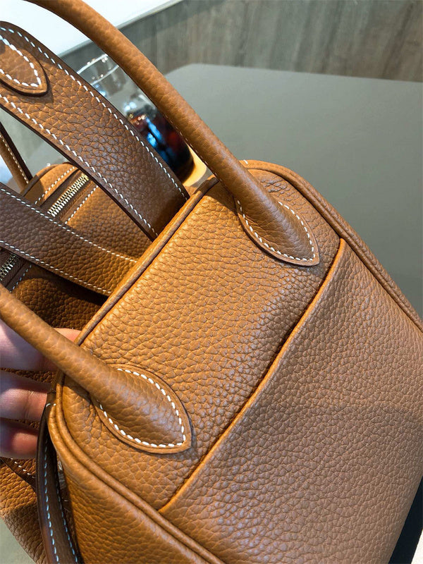 Side view of sleek structured handbag