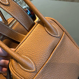 Side view of sleek structured handbag