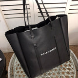 Front view of sleek premium women's handbag – women's premium purse