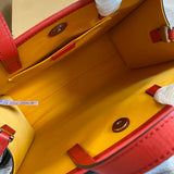 Side profile of signature statement women's handbag – women's luxury handbag