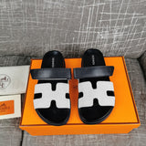 Hermès Red Crisscross Strap Sandals - Close-Up Texture View