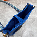 Side view of minimalist structured handbag