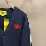 Full styled look of Gucci luxury clothing with label-forward styling