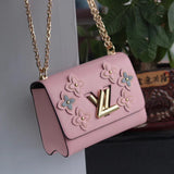 Handle and strap detail of premium sleek women's handbag – women's statement bag