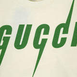 Flat lay presentation of Gucci luxury clothing with tailored silhouette