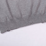 Side profile of Louis Vuitton luxury clothing with label-forward styling