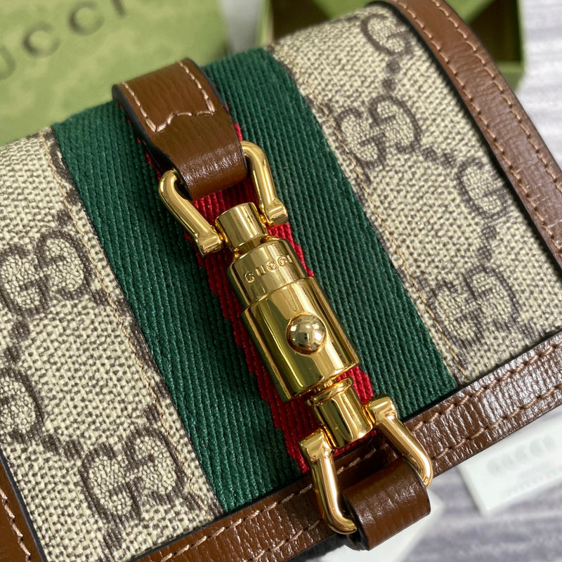 Back view of classic elevated women's handbag – women's statement bag