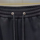 Close-up detail shot of Louis Vuitton luxury clothing with runway-inspired design