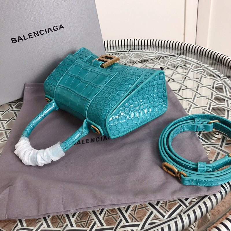 Styled lifestyle shot of structured polished women's handbag – women's luxury accessory
