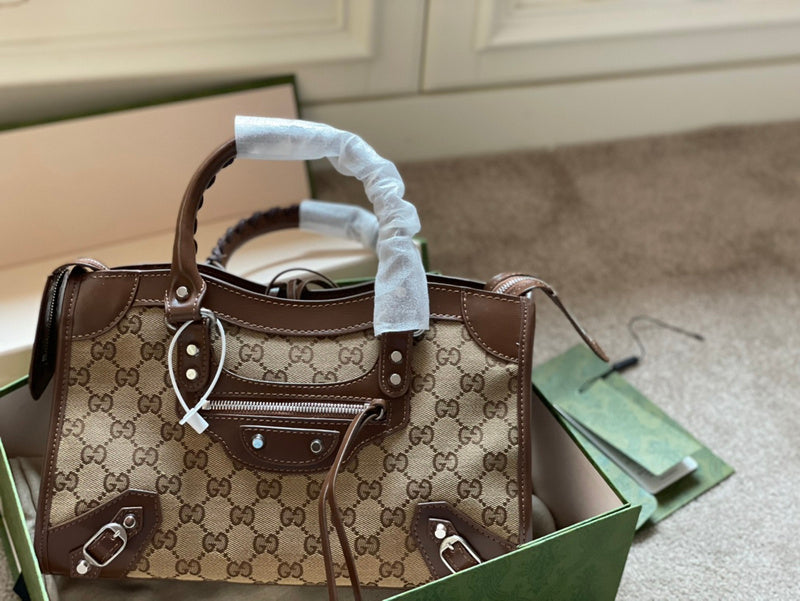 Ziva's Charm handbag – side angle view (one versatile size)