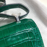 Side view of streamlined structured handbag