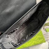 Side profile of sleek statement women's handbag – women's luxury handbag