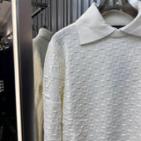 Close-up detail shot of Louis Vuitton luxury clothing with runway-inspired design